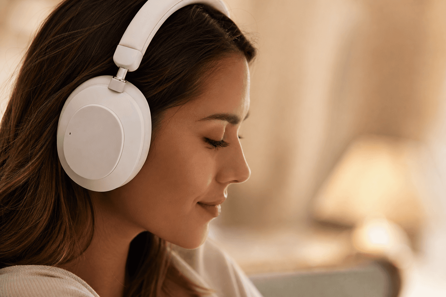 Person wearing premium white headphones